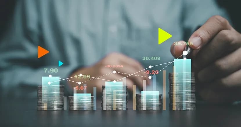 gráficos e moedas representando o split payment na reforma tributária