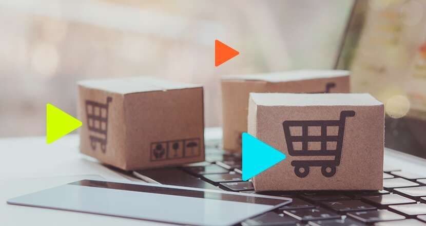 Caixas de papelão com ícones de carrinho de compras