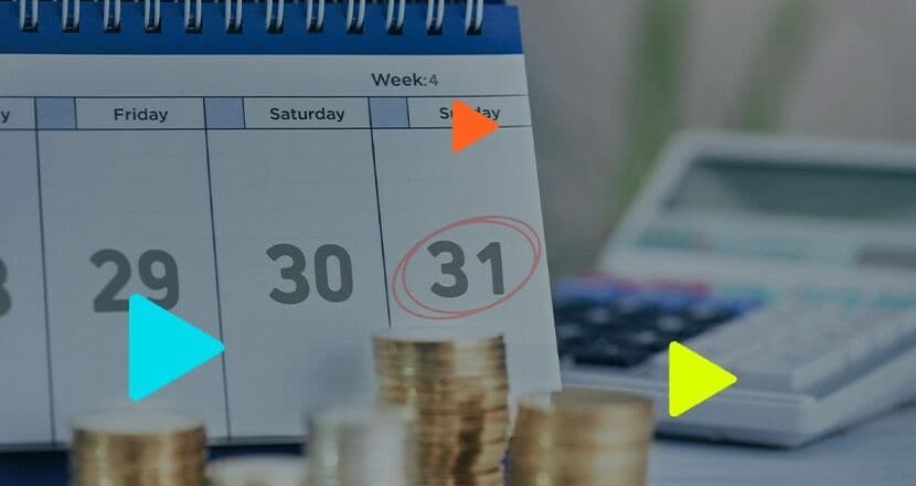 Calendário com data de pagamento e dinheiro empilhado