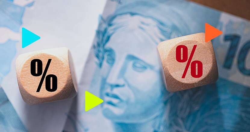 Cubes com símbolo de porcentagem sobre dinheiro